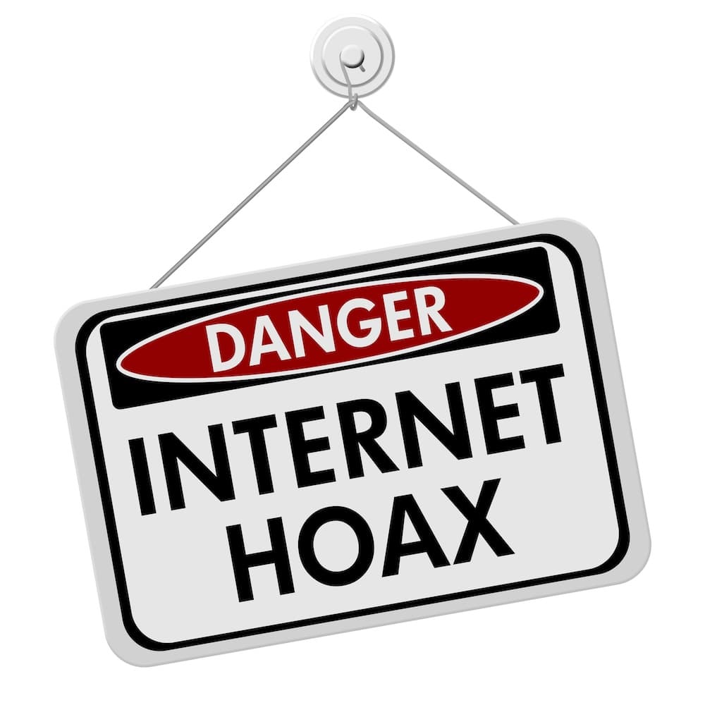A sign warning of the dangers of internet hoaxes. A sign warning of the dangers of internet hoaxes.