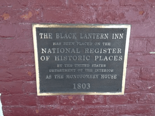 Plaque commemorating the Black Lantern Inn's inclusion on the National Register of Historic Places as the Montgomery House, established in 1803.